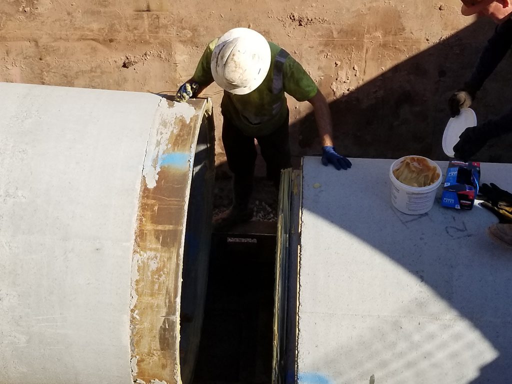 worker concrete precast pipe construction