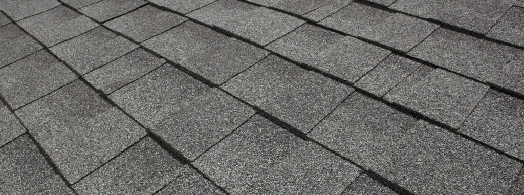 grey roofing shingles closeup