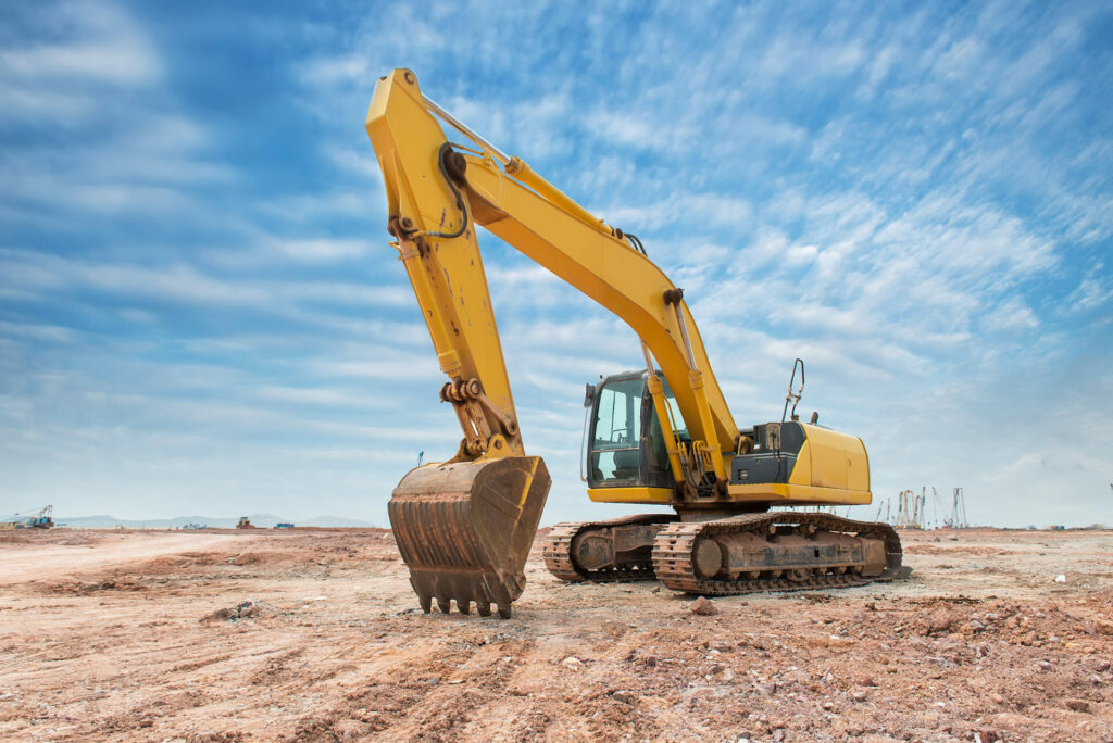 large heavy construction machinery on job site with HCCA