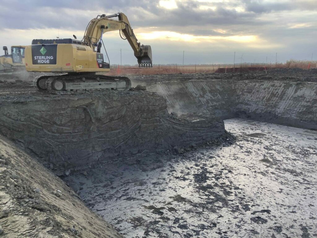 sterling ridge excavator digging hole