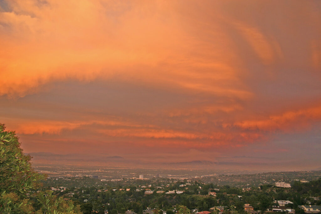 evidence of climate change with bright orange heat sky over LA 