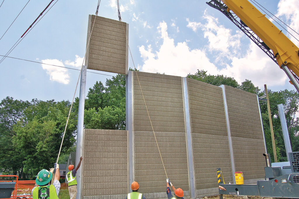 precast concrete panels being lowered on smith-midland project