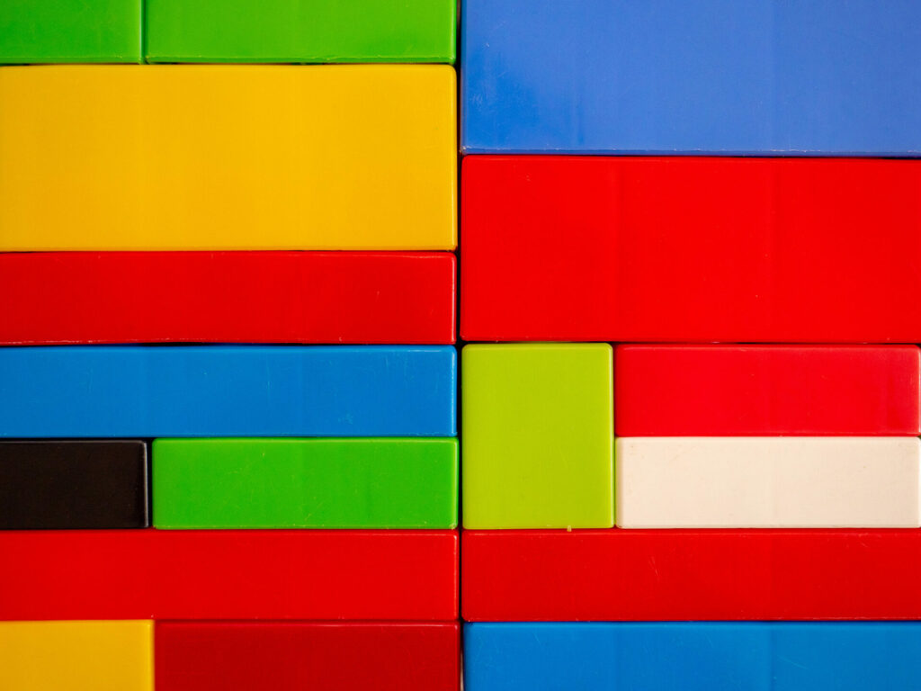 plastic colored building blocks symbolizing the color-coding of RENCO blocks