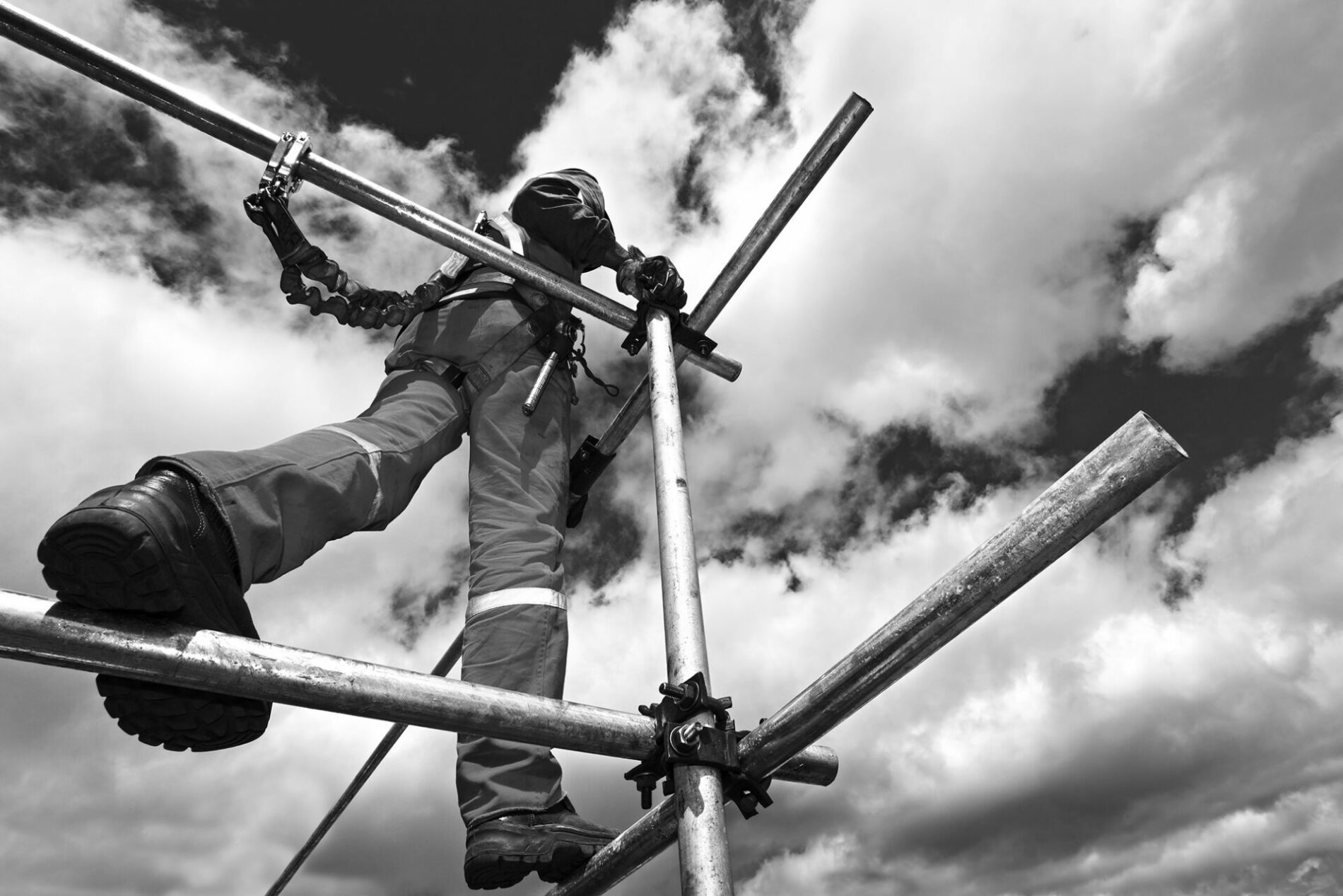 A man standing on scaffolding.