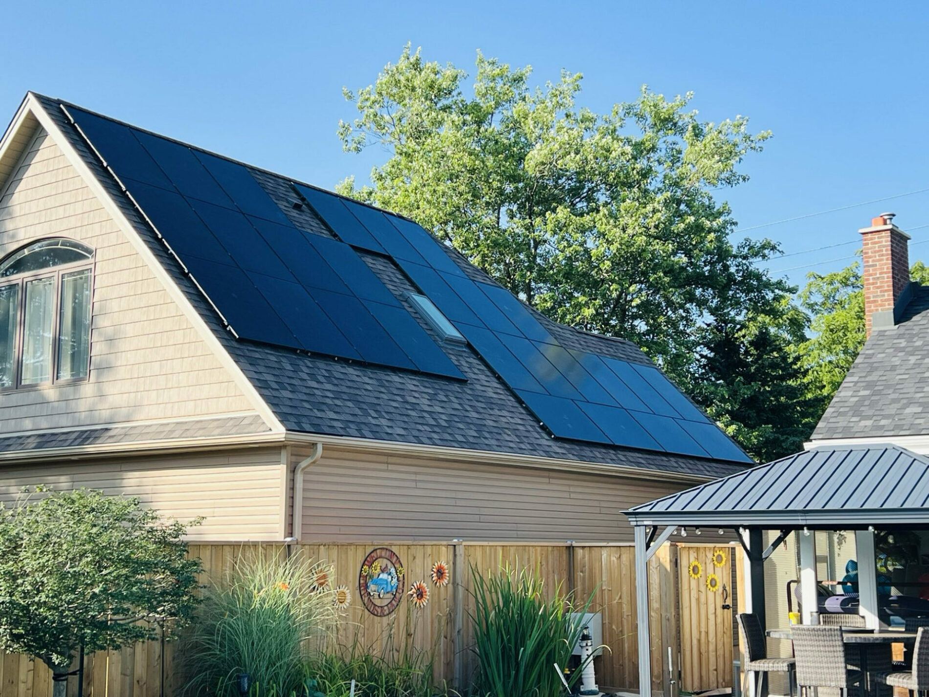 A house with Solar Panels installed on the roof.